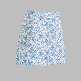 SCATTERED DITZY FLORAL SILKY TECH NLYON SKORT